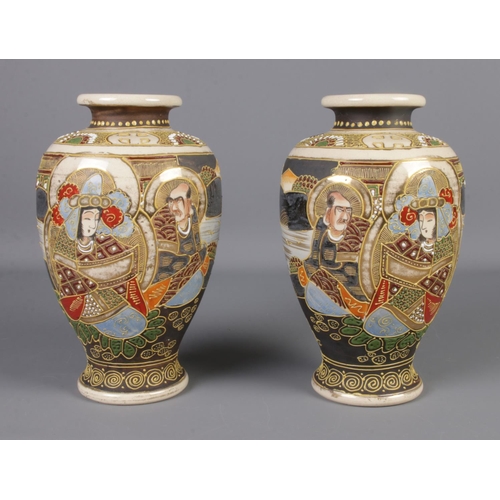 109 - A pair of Japanese satsuma vases with Goddess and Immortals design.

Height 25cm