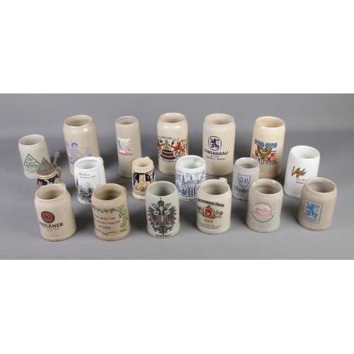 125 - A box of German stoneware tankards/steins to include several branded examples.