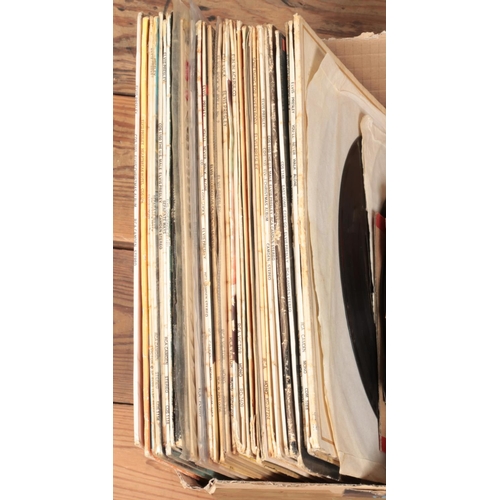 139 - A collection of Elvis Presley records and single including You'll Never Walk Alone, The Christmas Al... 