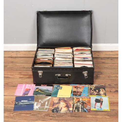 141 - A suitcase containing vinyl singles of mainly pop and easy listening to include ()