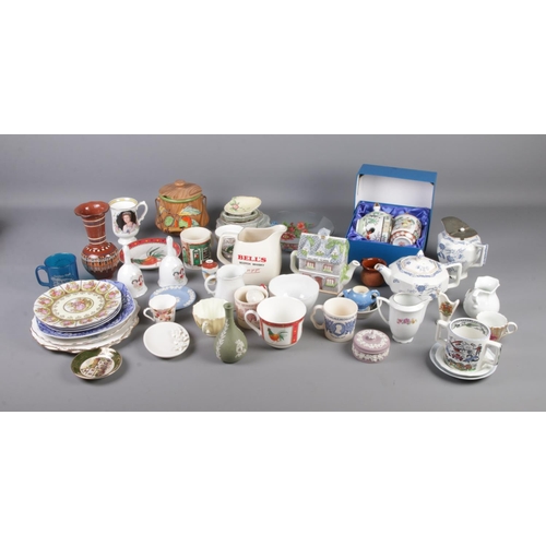 147 - A box of mixed ceramics and other items including Wedgewood, Roy Kirkham and commemorative mugs