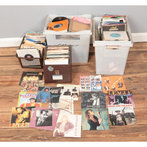 148 - Four boxes of vinyl singles of mainly pop and easy listening to include Human League, Mariah Carey, ... 