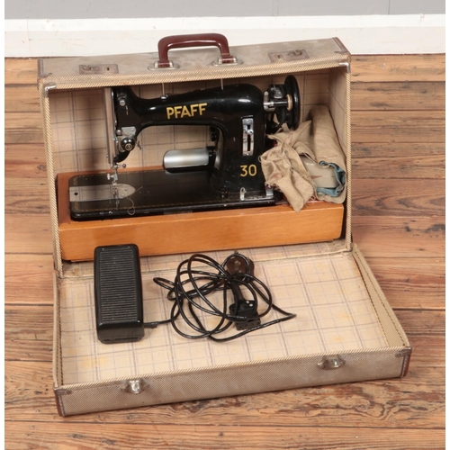 156 - A cased Pfaff 30 vintage sewing machine.