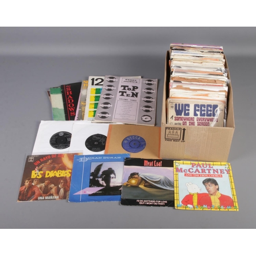 172 - A box of vinyl single records of mainly pop and rock examples to include Elvis Presley, The Rolling ... 