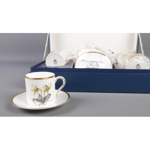 33 - A cased Royal Worcester 'Alpine Flowers' coffee set, containing six cups and saucers.