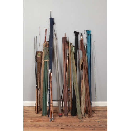 191 - A good collection of fishing rods including both vintage and modern examples.