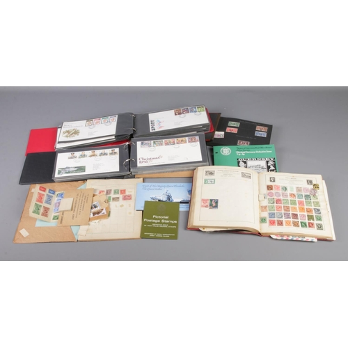 49 - A collection of world stamps and first day covers including British Penny Red, German WWII examples ... 