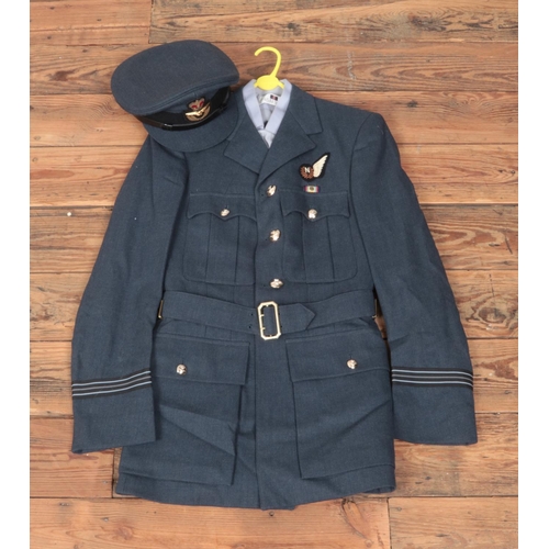 221 - An RAF officers dress uniform with cap, jacket, shirt and trousers.