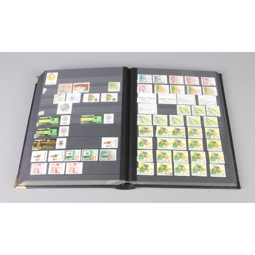 78 - A collection of Malaya and Singapore stamps in separate binder.