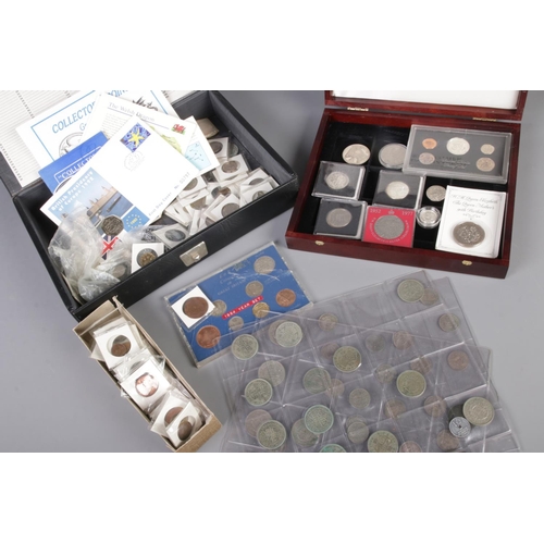 91 - Two cases of mixed coins including Unites States of America half dollar's, silver jubilee crown, 200... 