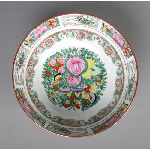 55 - A Chinese famille rose bowl with reign marks. C1930/40 Four character mark to base.