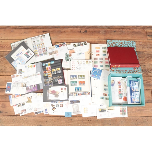 186 - A large quantity of stamps first day covers and presentation packs, some unfranked. To include great... 