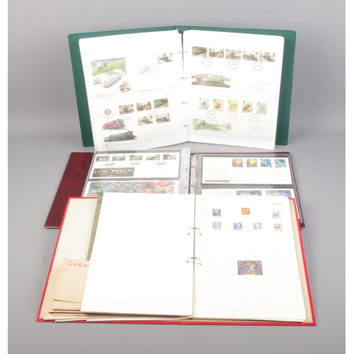 41 - Three albums of stamps including first day covers, presentation packs and loose examples.