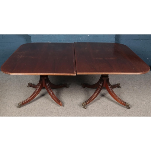 949 - A mahogany twin pedestal table.