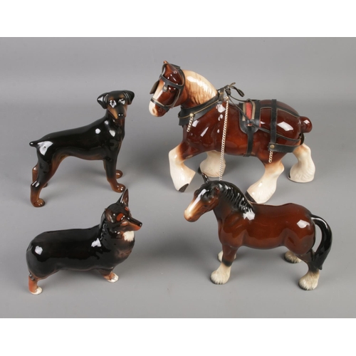 106 - Two Beswick horses with two Beswick dogs.