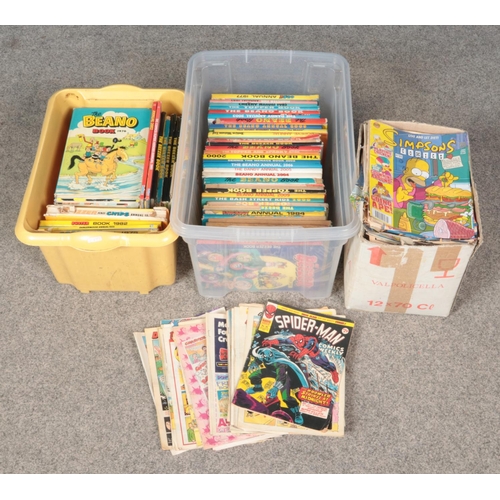 494 - Three boxes of annuals and comics. Includes Beano, Dandy, Spiderman Comic Weekly, Topper, etc.