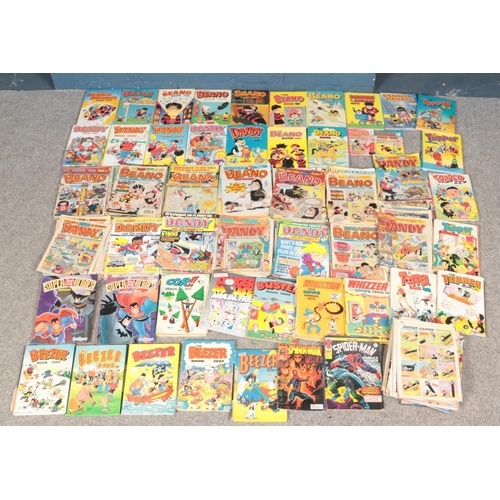 494 - Three boxes of annuals and comics. Includes Beano, Dandy, Spiderman Comic Weekly, Topper, etc.