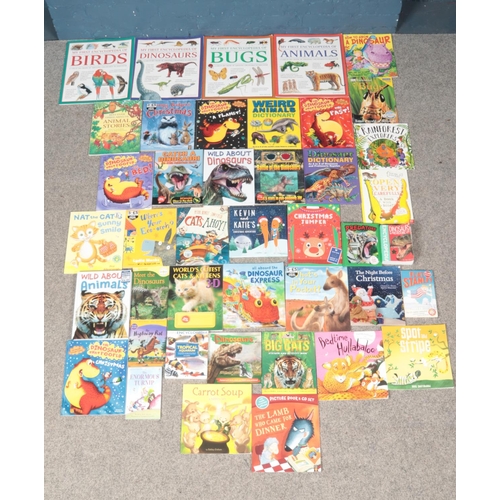 495 - A collection of children's non-fiction and story books, including several based around dinosaurs.