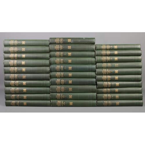 500 - A collection of thirty linen bound 'The Novels of Charles Dickens', The London Edition. The Caxton P... 