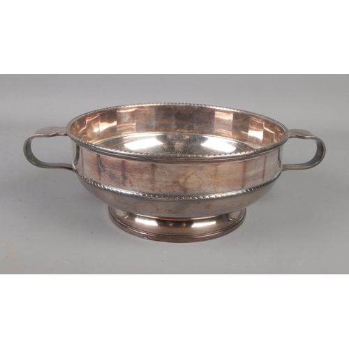 108 - A Harrods silver plate twin handled bowl. (20cm diameter)