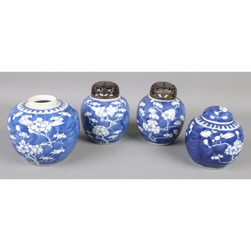 112 - Four Oriental blue & white ceramic ginger jars with Prunus Blossom decoration. Includes pair with wo... 