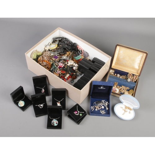 130 - A box of costume jewellery. Includes dress rings, earrings, boxed necklaces etc.