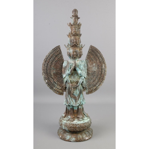 148 - A bronze figure of the thousand arm manifestation of Guanyin.

Height 48cm