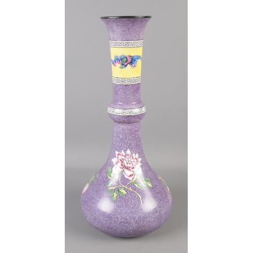15 - A Bishop and Stonier large purple glaze vase. Decorated with flowers, mythical beast and Greek key b... 