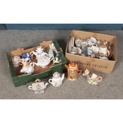 166 - Two boxes of mixed ceramics and glassware to include novelty teapots by Sadlers, Spathers, Price and... 