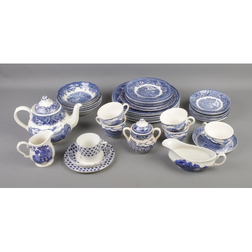 202 - One box of blue and white ceramics including Ridgway Staffordshire and Barratts.