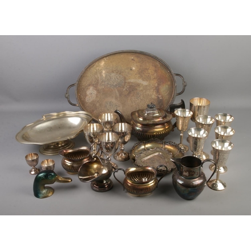 204 - A quantity of metalwares and silver plate including goblets, teapot, coalscuttle sugar bowl and more