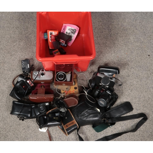 205 - A box of photographic equipment. Including Minolta AL-F, Canon EOS100QD, Movikon 8, Pentax flash hea... 