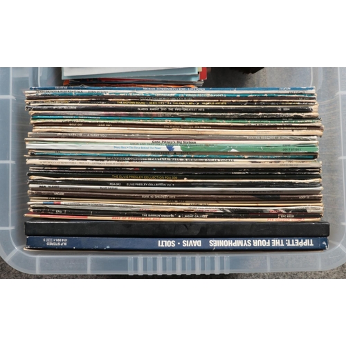 221 - Two boxes of LP and single records. Includes Wham, Elvis, The Shadows, etc. Beatles and Amy Winehous... 