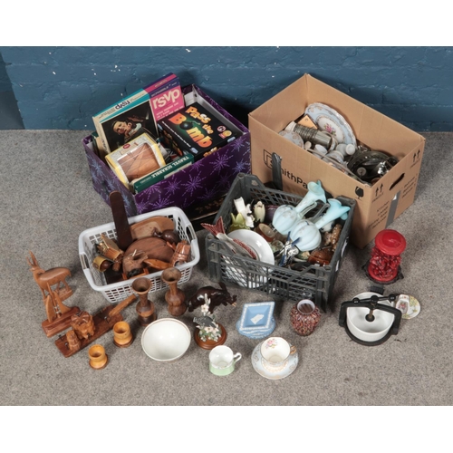 225 - An assorted collection of woodenware, ceramics and other collectable pieces including various figuri... 