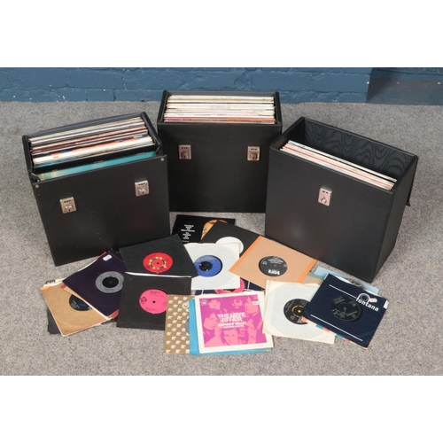 245 - Three carry cases of LP and single records. Includes The Kinks, Kiss, Cat Stevens, Fleetwood Mac etc... 
