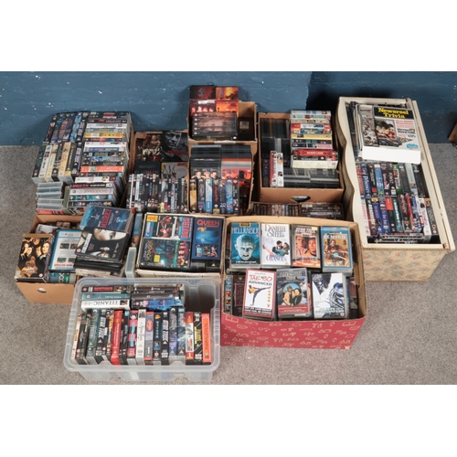 251 - A large quantity of VHS and DVDs. Includes Star Trek, Star Wars, Lord of the Rings, Buffy the Vampir... 