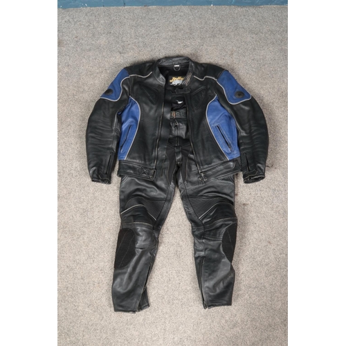254 - A Buffalo motorbike jacket and matching trousers. Size UK 44.