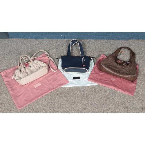 272 - Three Radley handbags, with dust jackets.