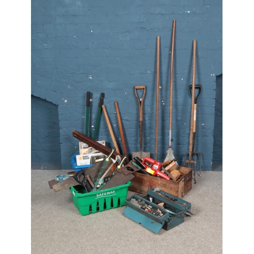 283 - A large quantity of tools including gardening equipment, electrical jigsaw, planes, saws, hammers an... 