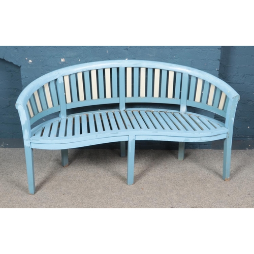 284 - A blue curved garden banana bench.