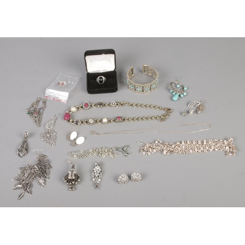 59 - A collection of white metal costume jewellery to include one silver ring, assorted necklaces, earrin... 