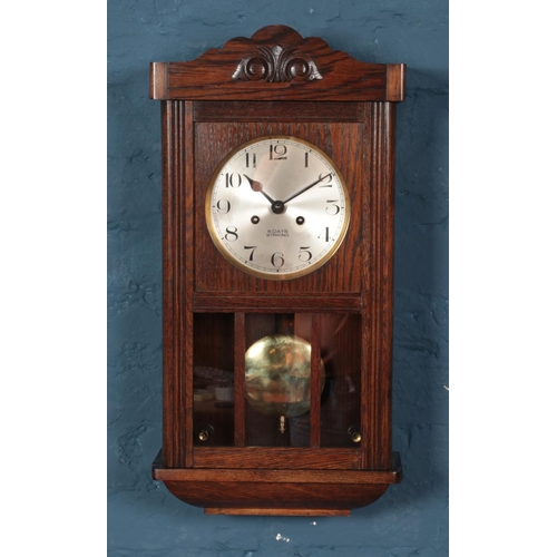 295 - A carved oak 8 day  Haller wall clock.