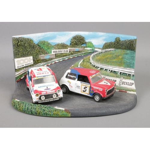 64 - A Corgi 1:43 scale No. 05508 diorama comprising Mini Championship Winners Set; Mini Se7en and Mini M... 