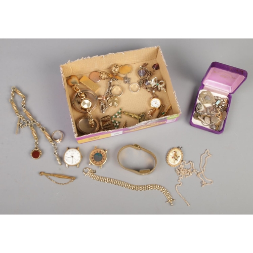 328 - A quantity of vintage jewellery. Includes fob on chain, rings, watches, brooches, small collection o... 