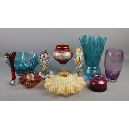 77 - A good collection of coloured glass. Includes retro light shade, controlled bubble examples, Murano ... 