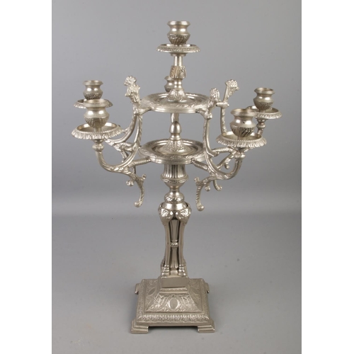 78 - An ornate metal five branch candelabra. With chicken head decoration. (51cm)