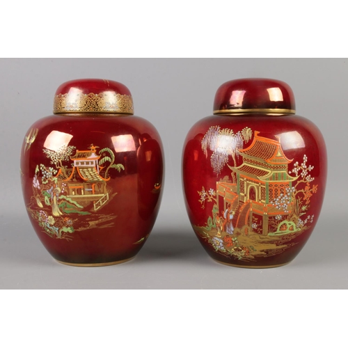 375 - A pair of Carlton Ware lidded ginger jars. One in the Rouge Royale pattern and one similar. 18.5cm t... 