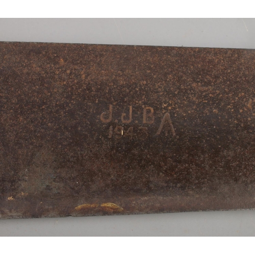 387 - A 1943 British military issue machete, with broad arrow mark and initials JJB, together with a Switz... 