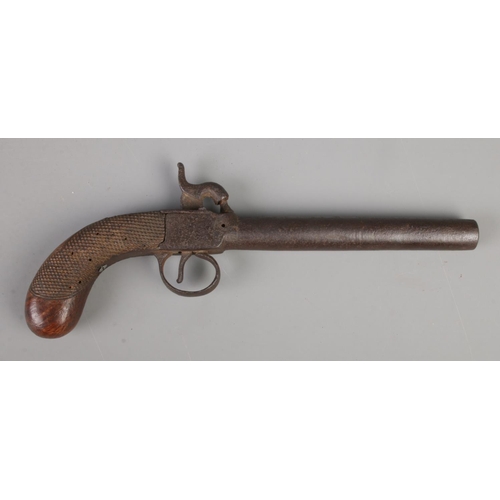 388 - A Nineteenth century Belgian percussion cap pistol with chequered walnut grip. CANNOT POST OVERSEAS