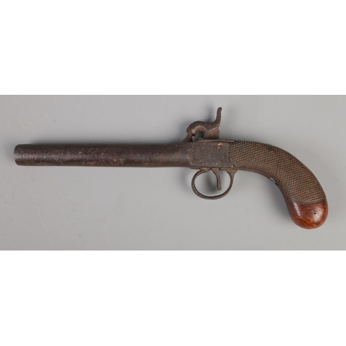 388 - A Nineteenth century Belgian percussion cap pistol with chequered walnut grip. CANNOT POST OVERSEAS